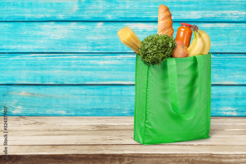 Full shopping  bag with colorful products