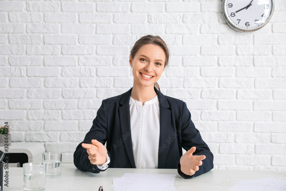 Young woman during job interview in office