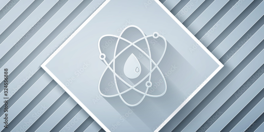 Paper cut Atom icon isolated on grey background. Symbol of science, education, nuclear physics, scie