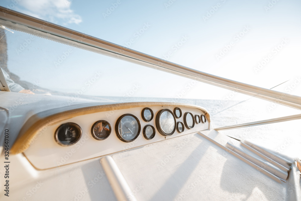 White yacht dashboard outdoors, close-up view