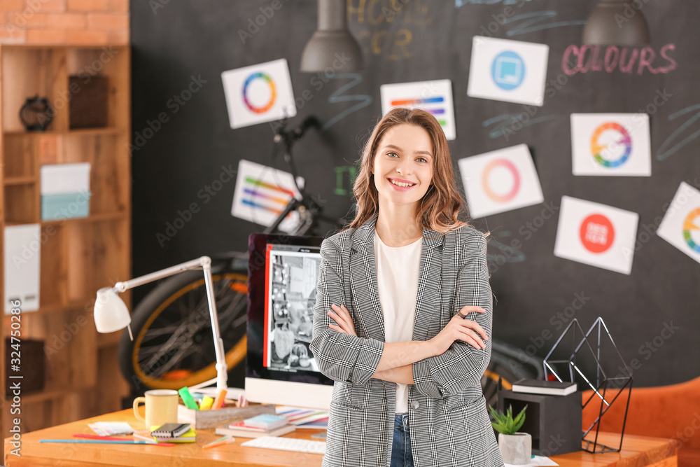 Portrait of female interior designer in office