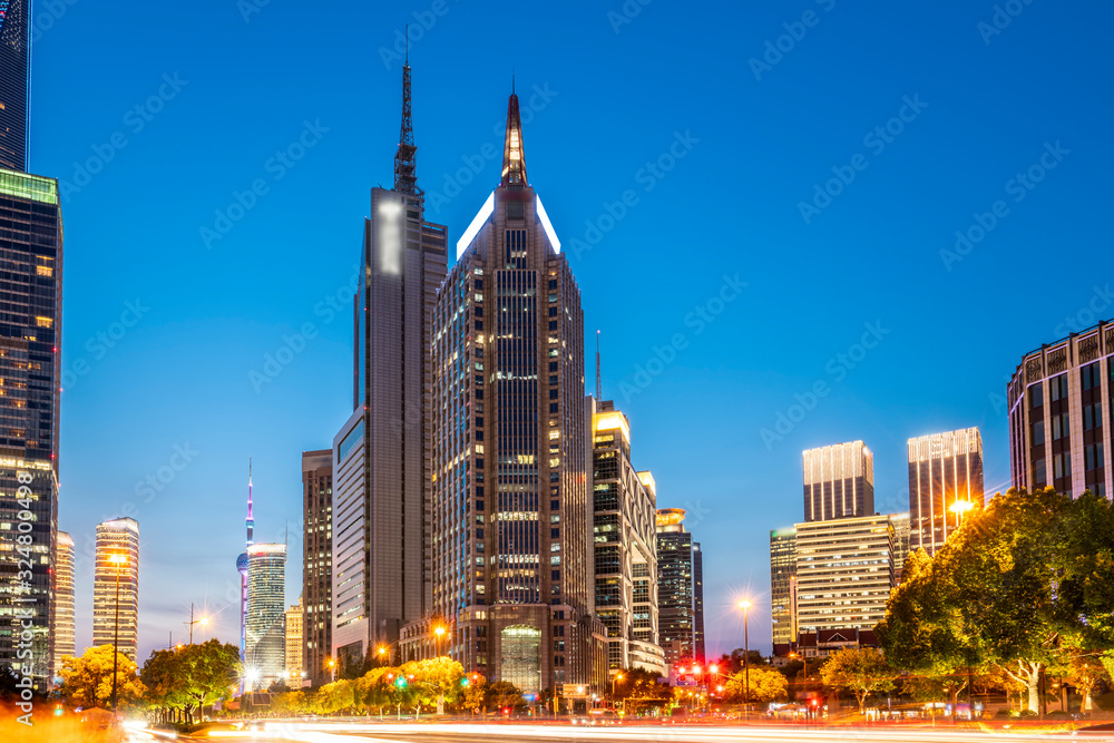 The light trace of modern architecture background in Lujiazui, Shanghai..