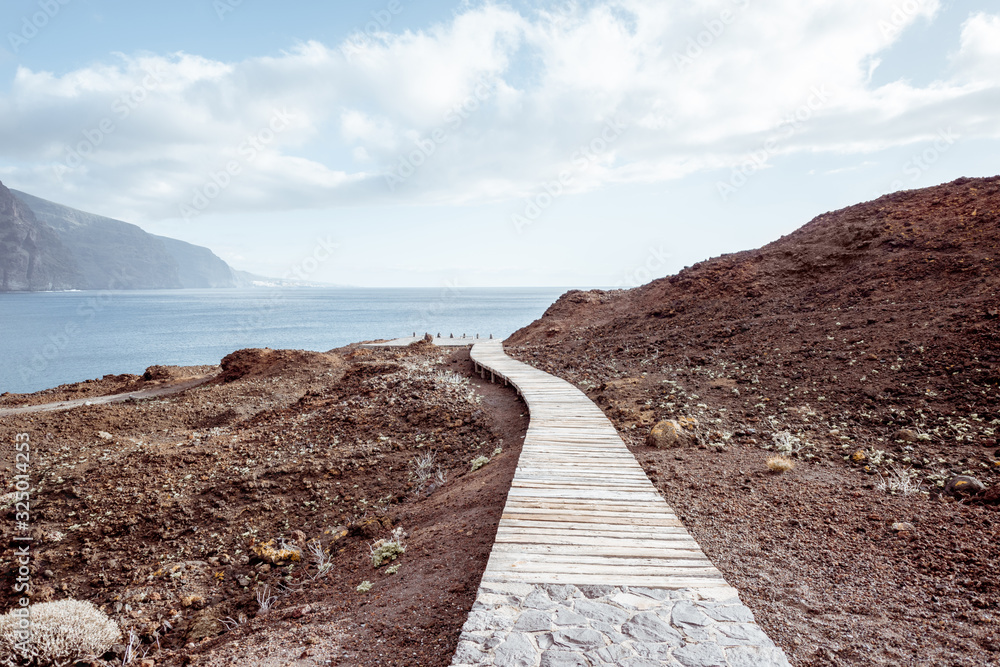 Beautiful boardwalk on the rocky ocean shore on tenerife island, Spain