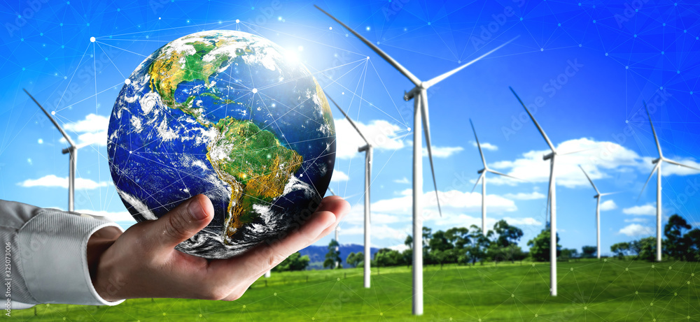 Concept of sustainability development by alternative energy. Man hand take care of planet earth with