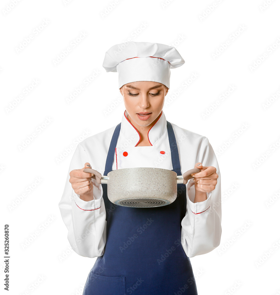 Beautiful female chef with tasty dish on white background