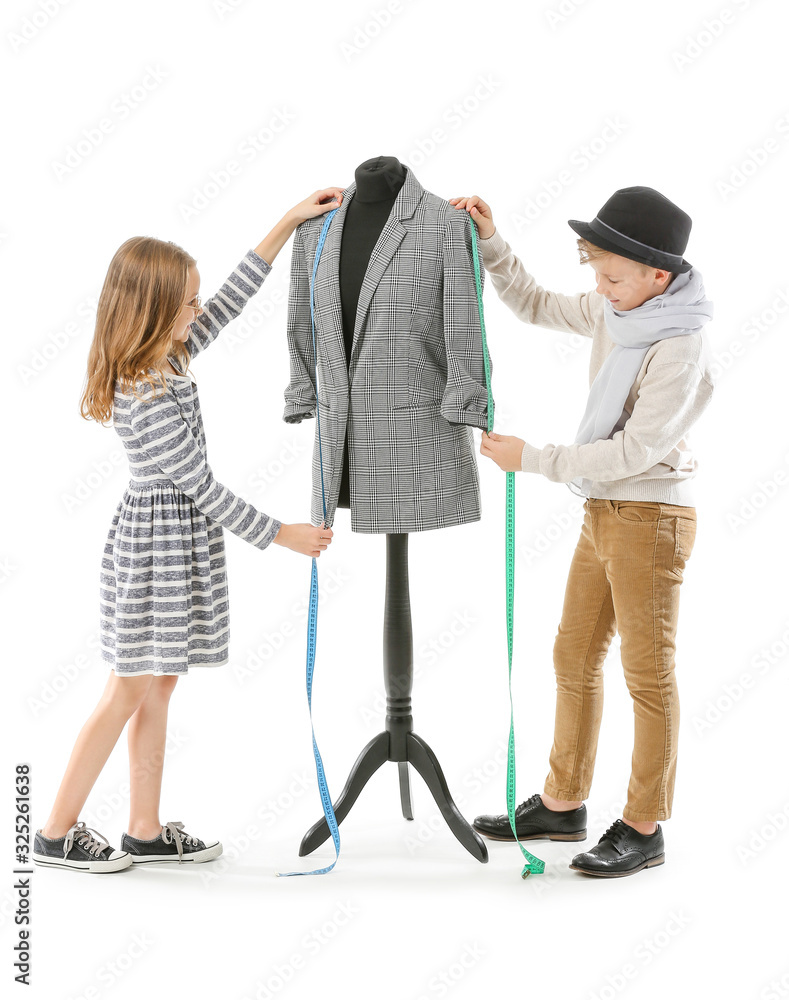 Cute little tailors with mannequin on white background