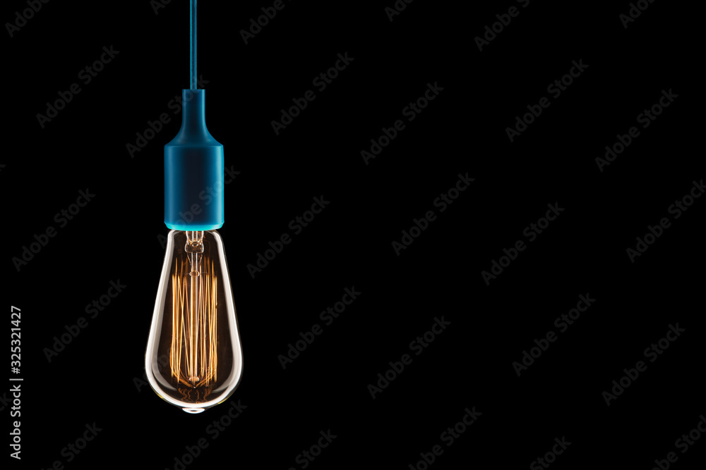 Idea and teamwork concept - Vintage incandescent bulbs on black background