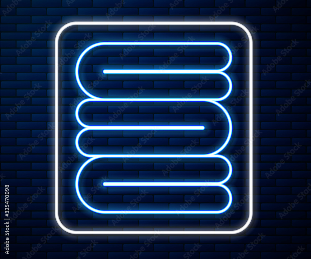 Glowing neon line Towel stack icon isolated on brick wall background.  Vector Illustration