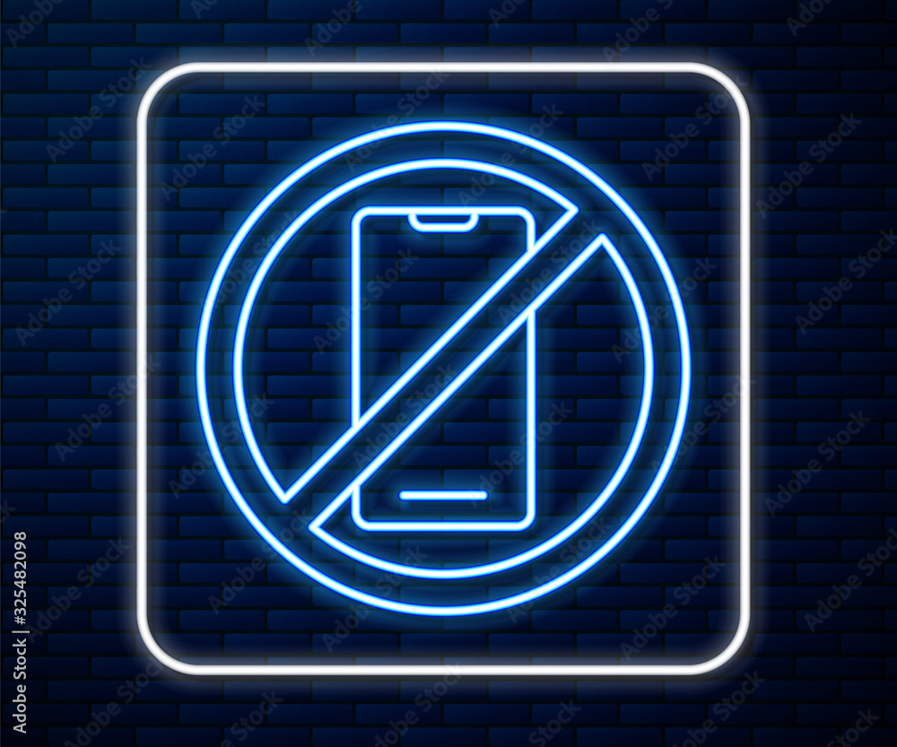 Glowing neon line No cell phone icon isolated on brick wall background. No talking and calling sign.