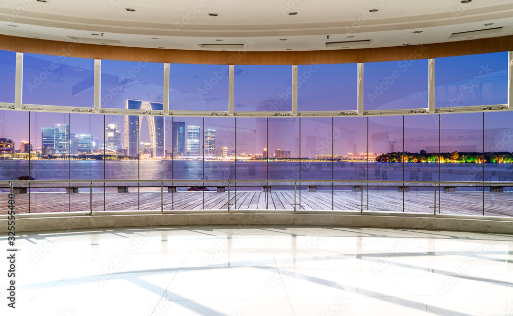 Office building glass and city skyline