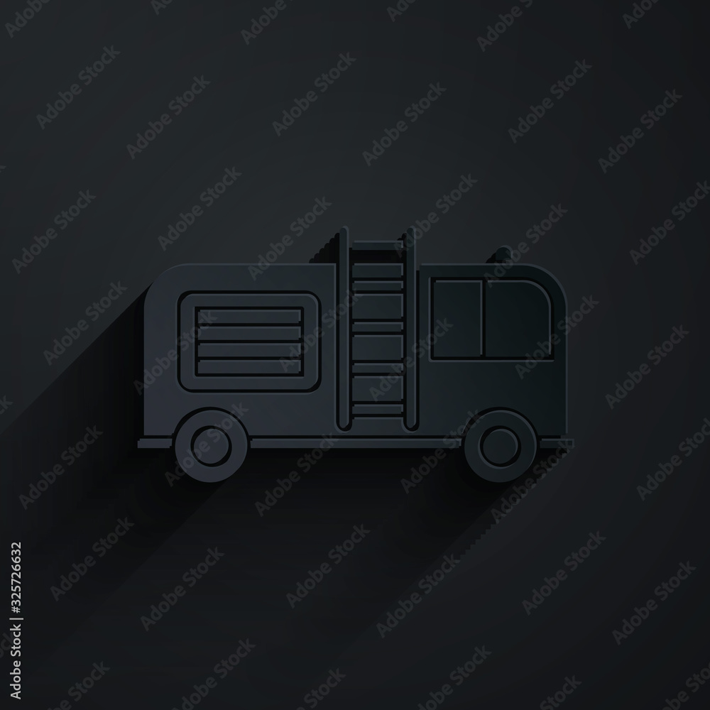 Paper cut Fire truck icon isolated on black background. Fire engine. Firefighters emergency vehicle.