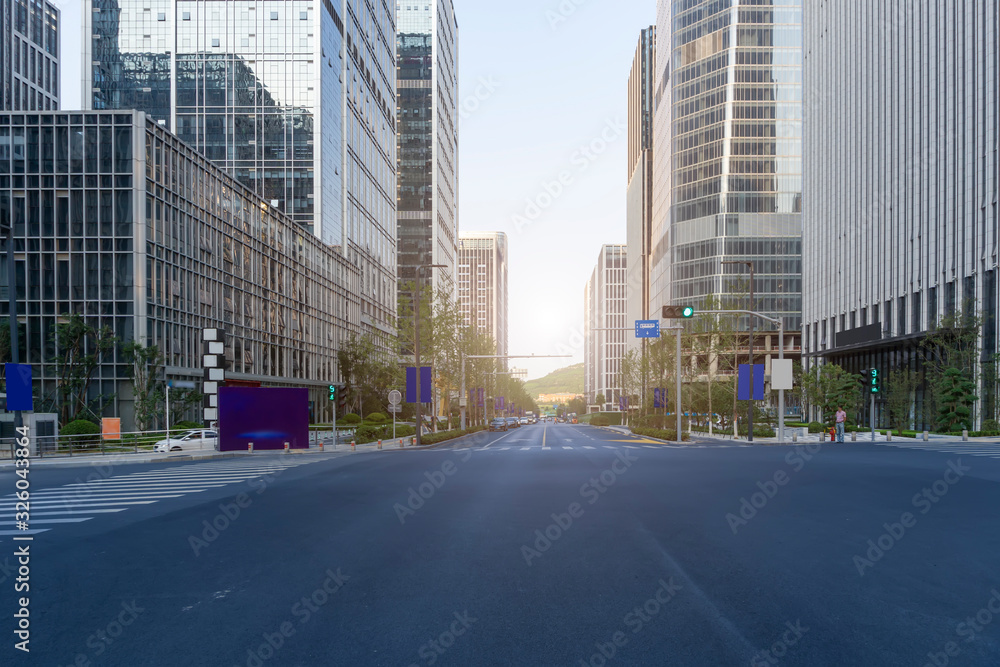 Urban road and modern office building of Ningbo business district