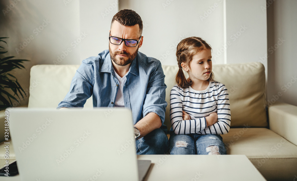 family a businessman father working at a computer and his child daughter  offended angry .