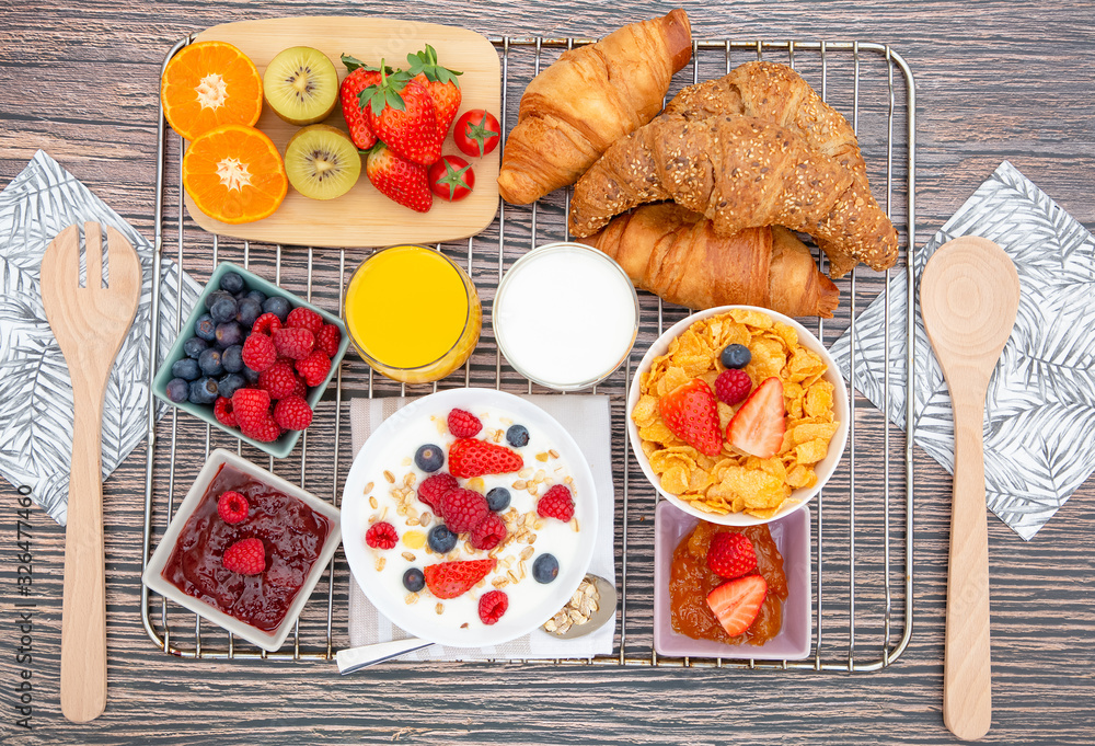 Breakfast Served in the morning with Butter croissant and corn flakes Whole grains and raisins with 