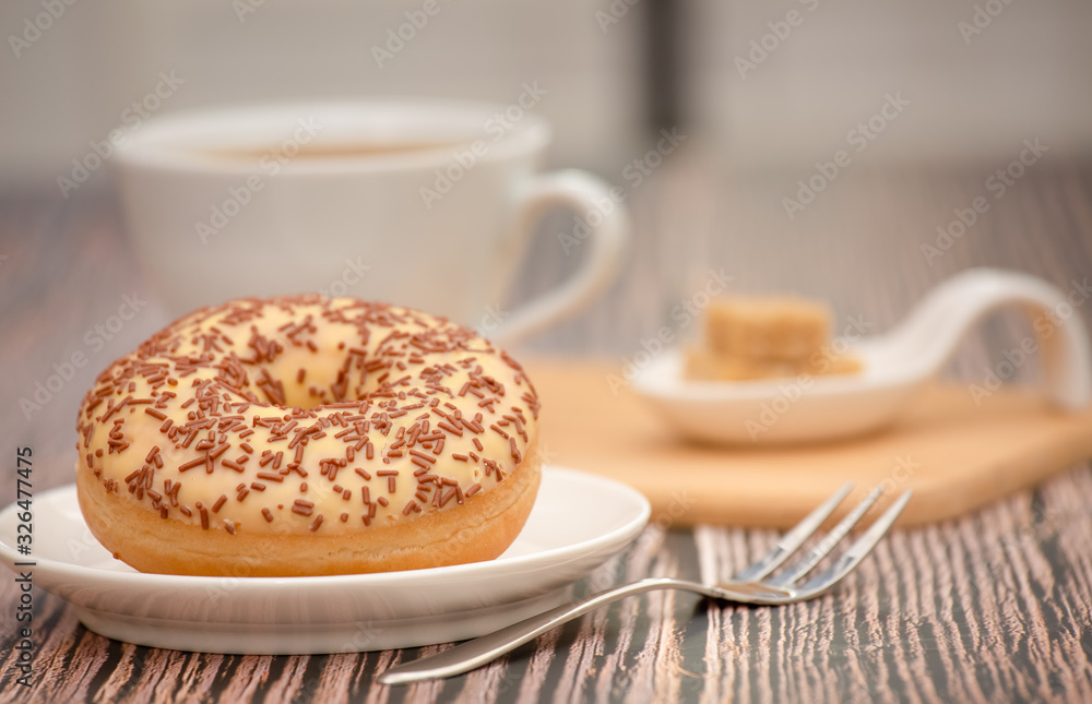 Dessert, Donuts, chocolate and strawberry circles, sugar and cream on Donuts and hot coffee cups, pr