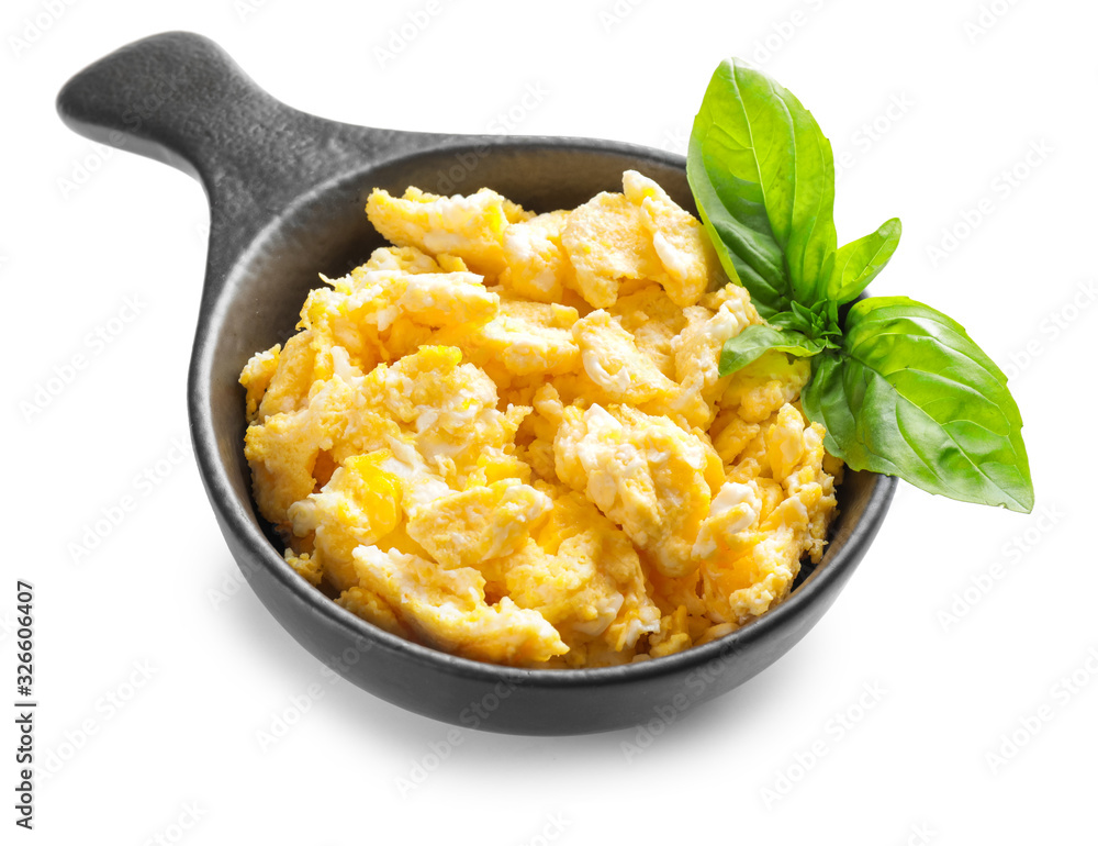 Frying pan with scrambled egg on white background