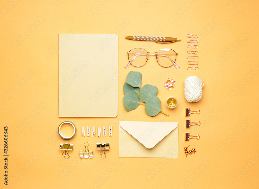 Set of school supplies with eyeglasses on color background