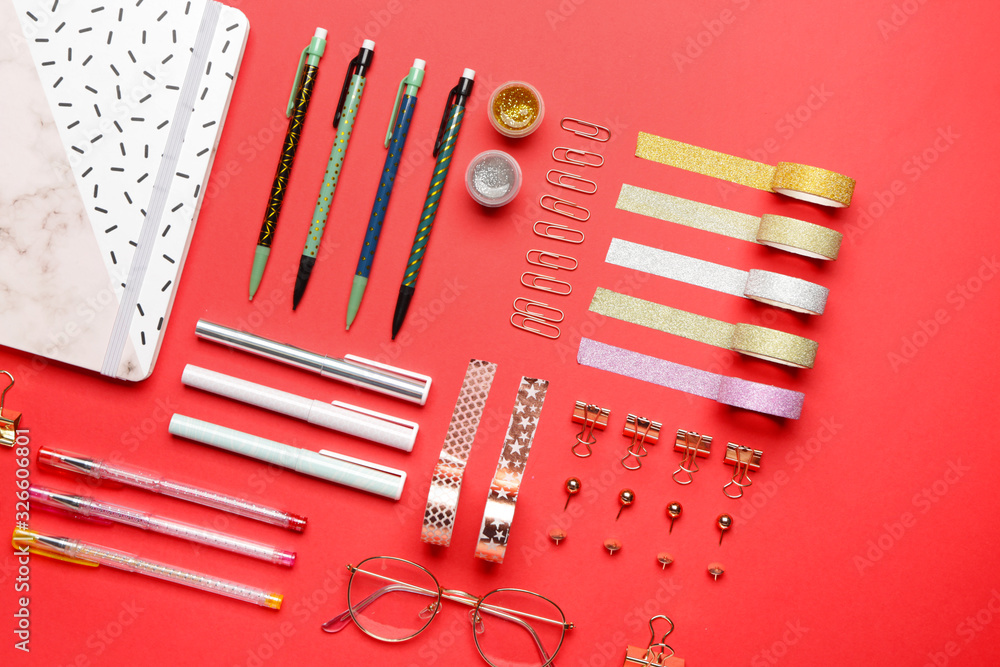 Set of school supplies on color background