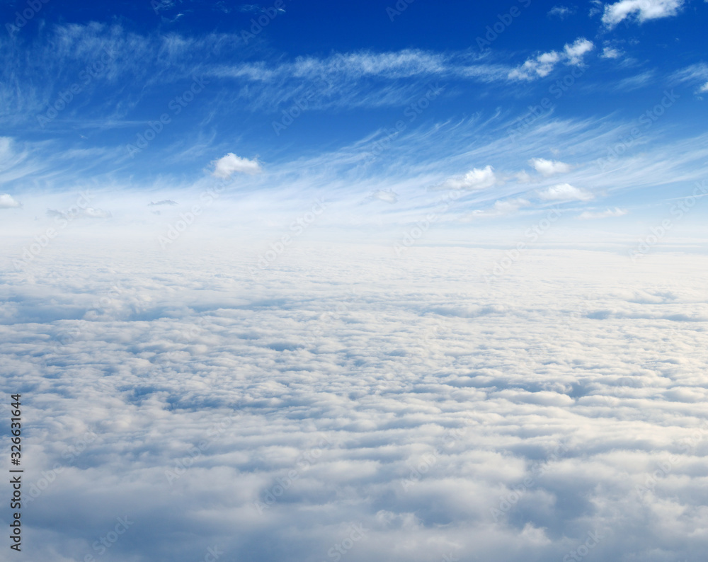 White clouds. View from the window of an airplane