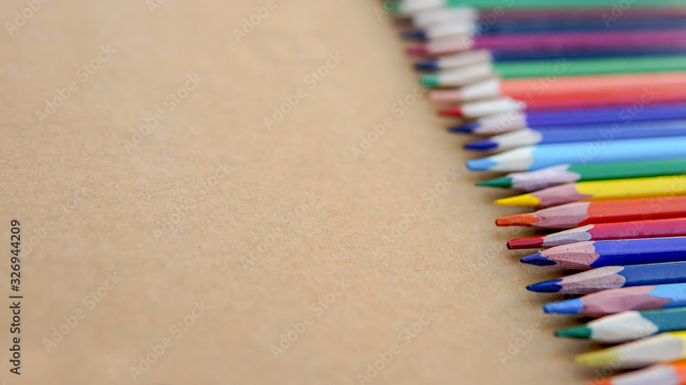 Brand advertising marketing strategy identity business concept. Colorful pencils in a row