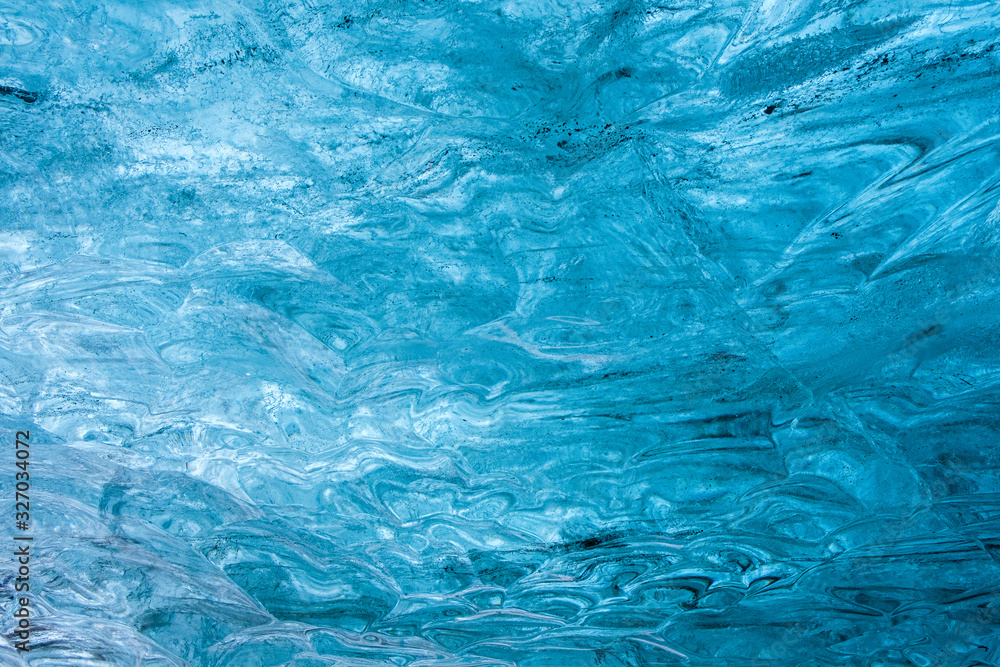 Ice pattern with waves from the Vatnajökull glacier ice cave