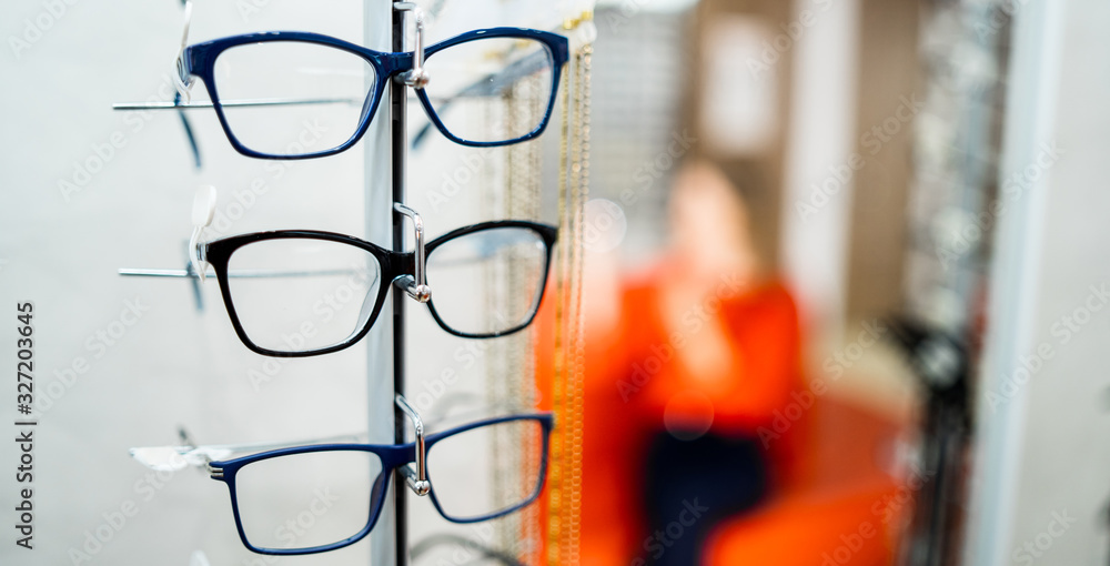 Eyeglasses shop. Stand with glasses in the store of optics.