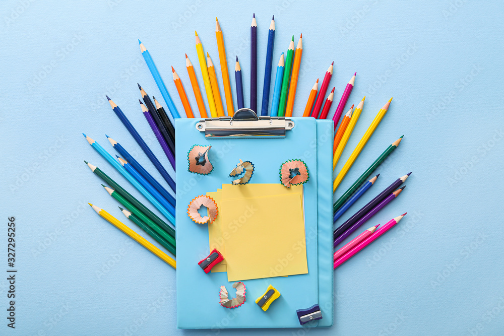 Set of school stationery on color background