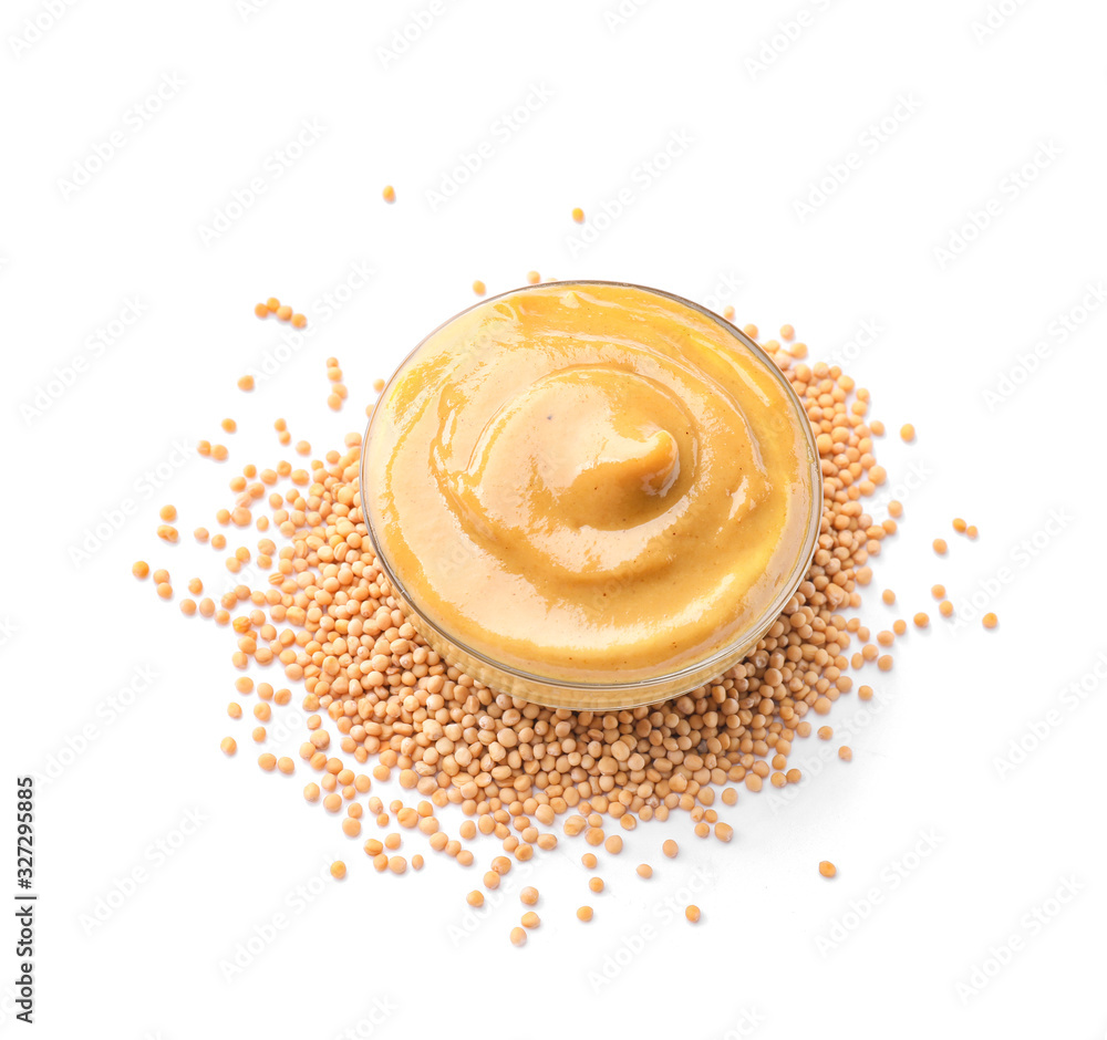 Bowl of tasty honey mustard sauce on white background