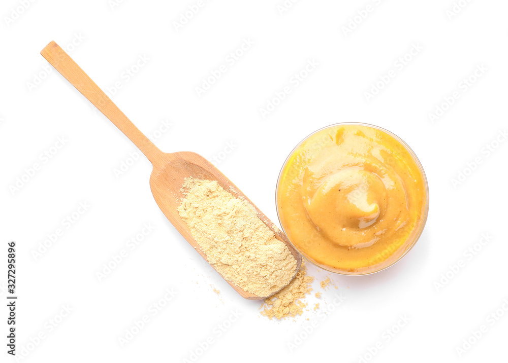 Bowl of tasty honey mustard sauce on white background