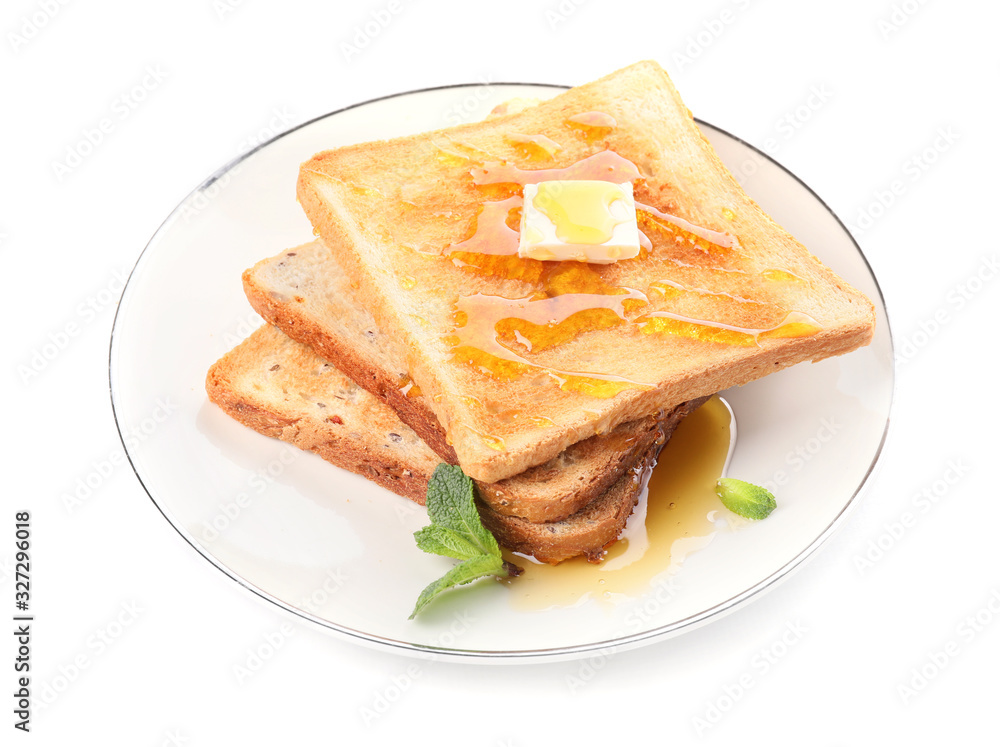 Tasty toasted bread with honey and butter on white background