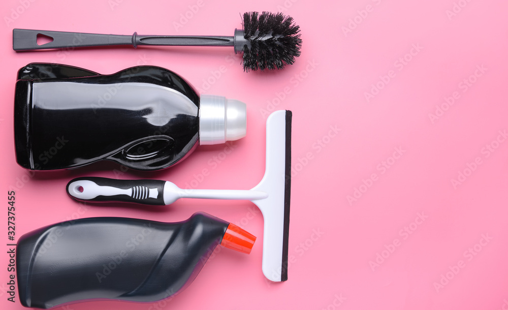 Set of cleaning supplies on color background