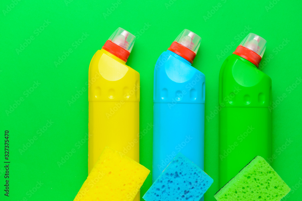 Set of cleaning supplies on color background