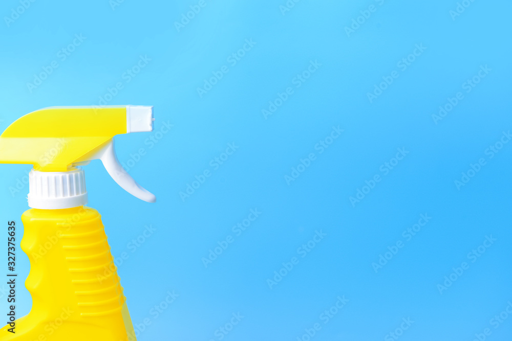 Bottle of detergent on color background