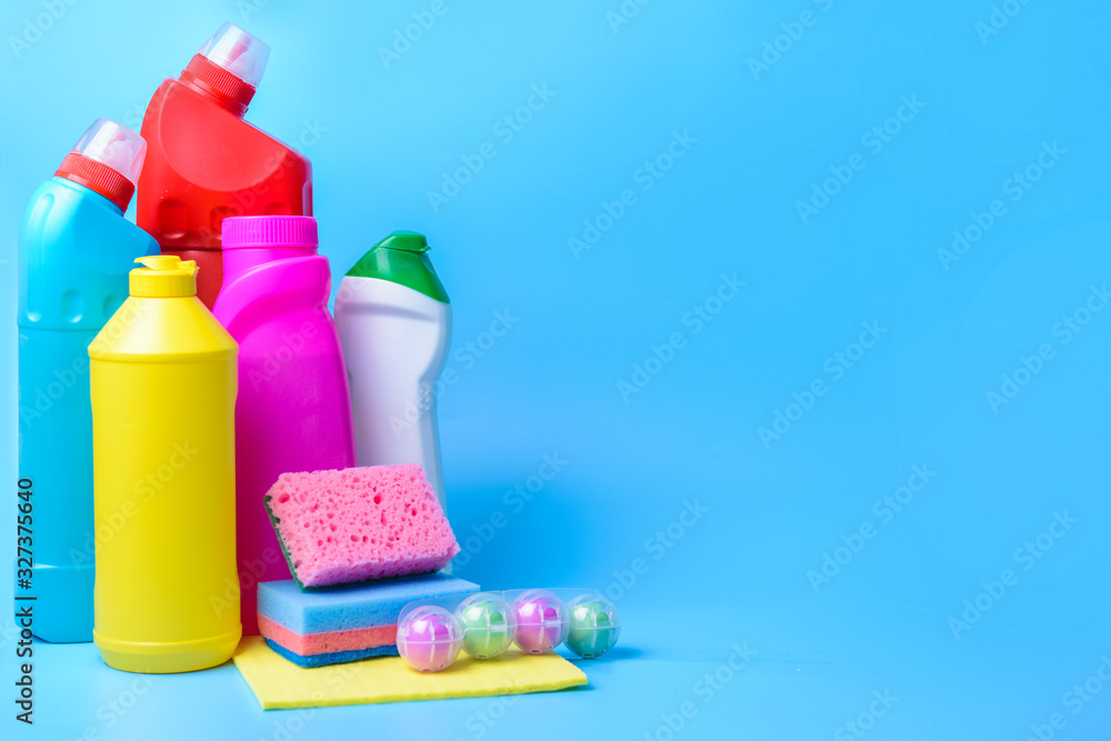 Set of cleaning supplies on color background