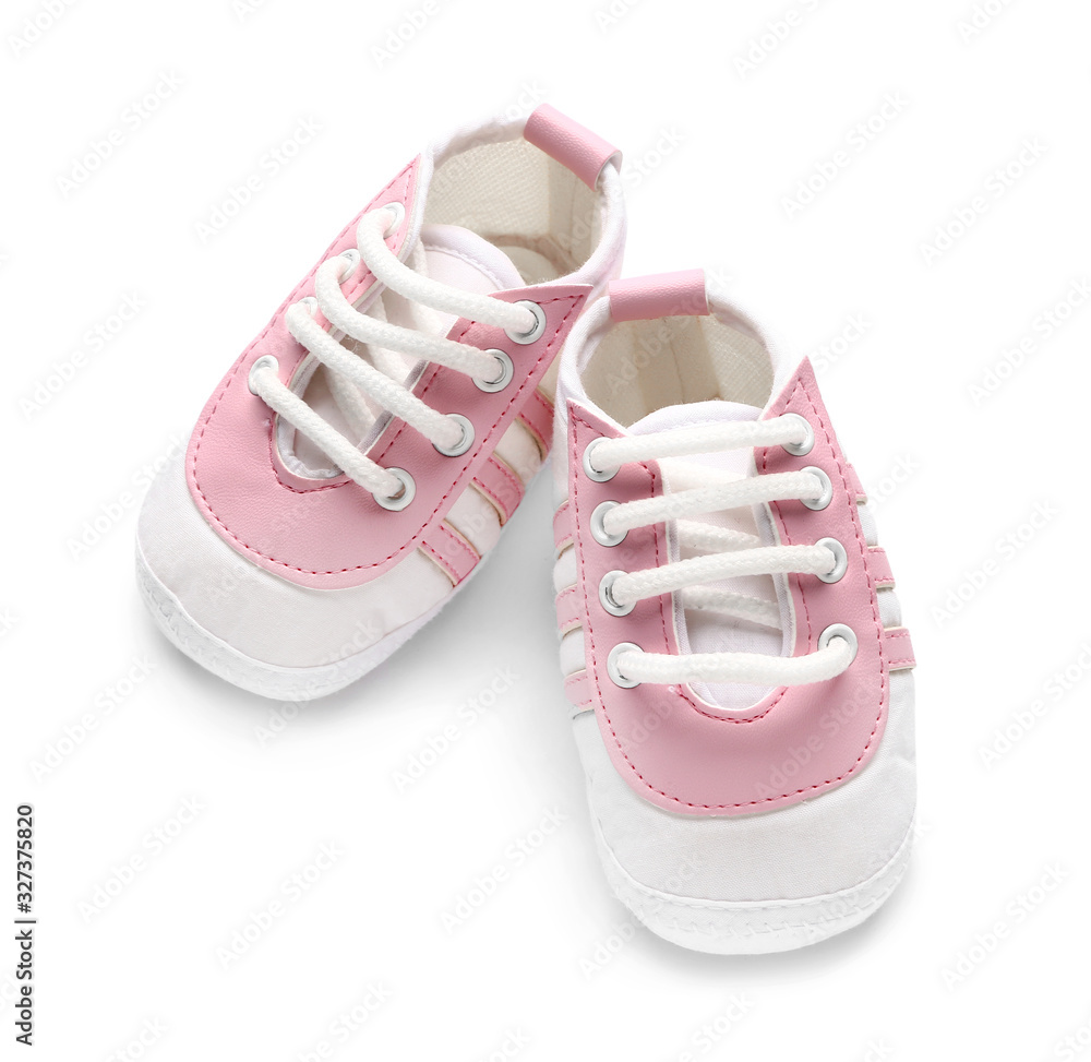 Baby booties on white background