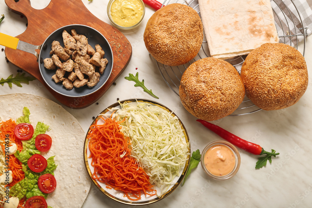 Ingredients for tasty doner kebab on table