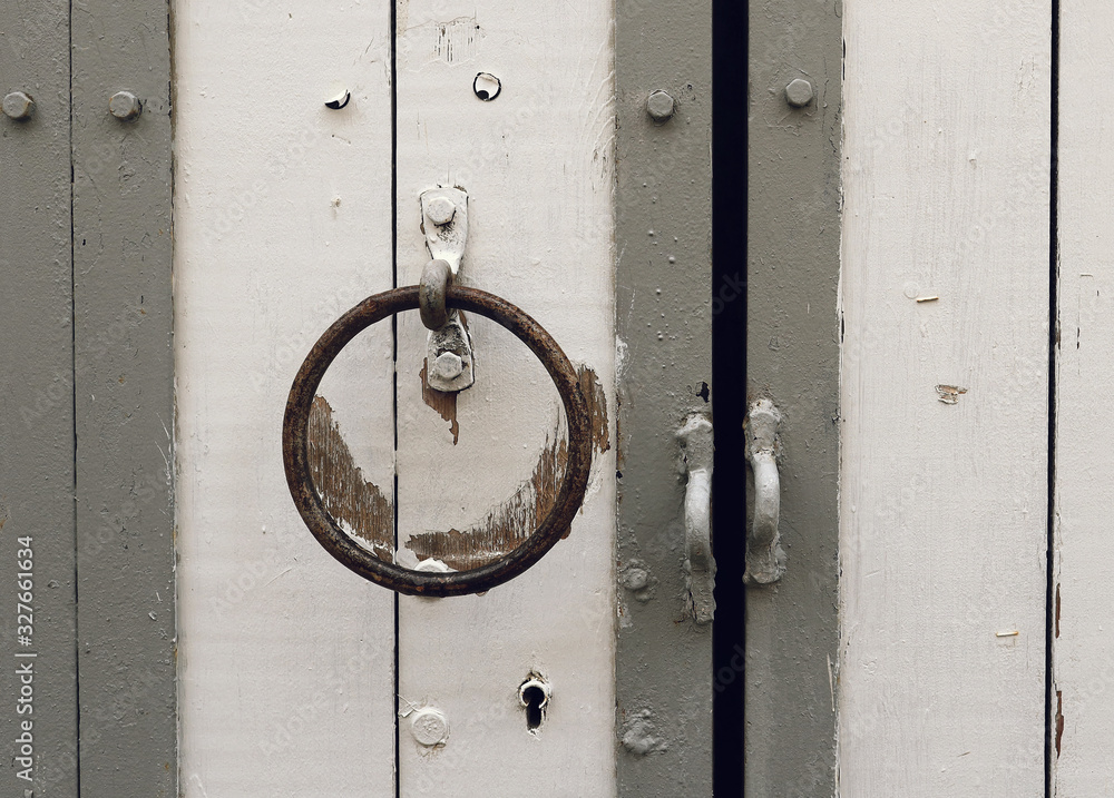 Grey Doors to backyard in Tallinn Old Town