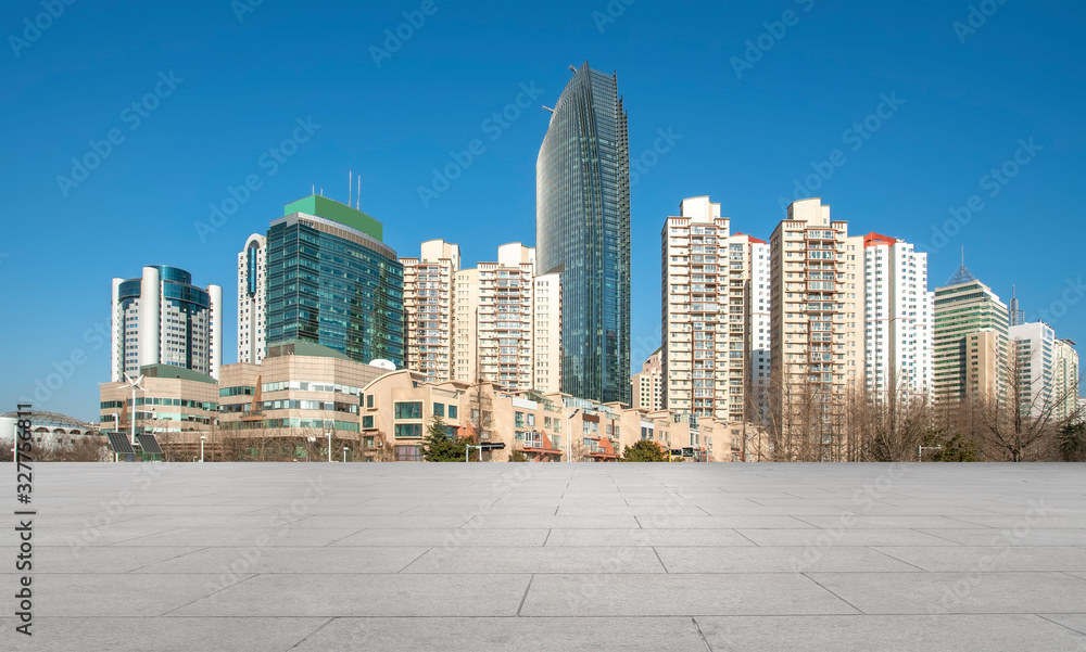 Qingdao city skyline and square floor tile building landscape..