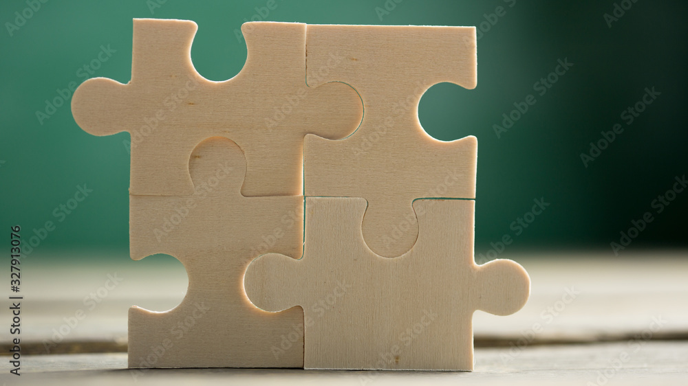 Creative solution for idea - business concept, jigsaw puzzle on the blackboard