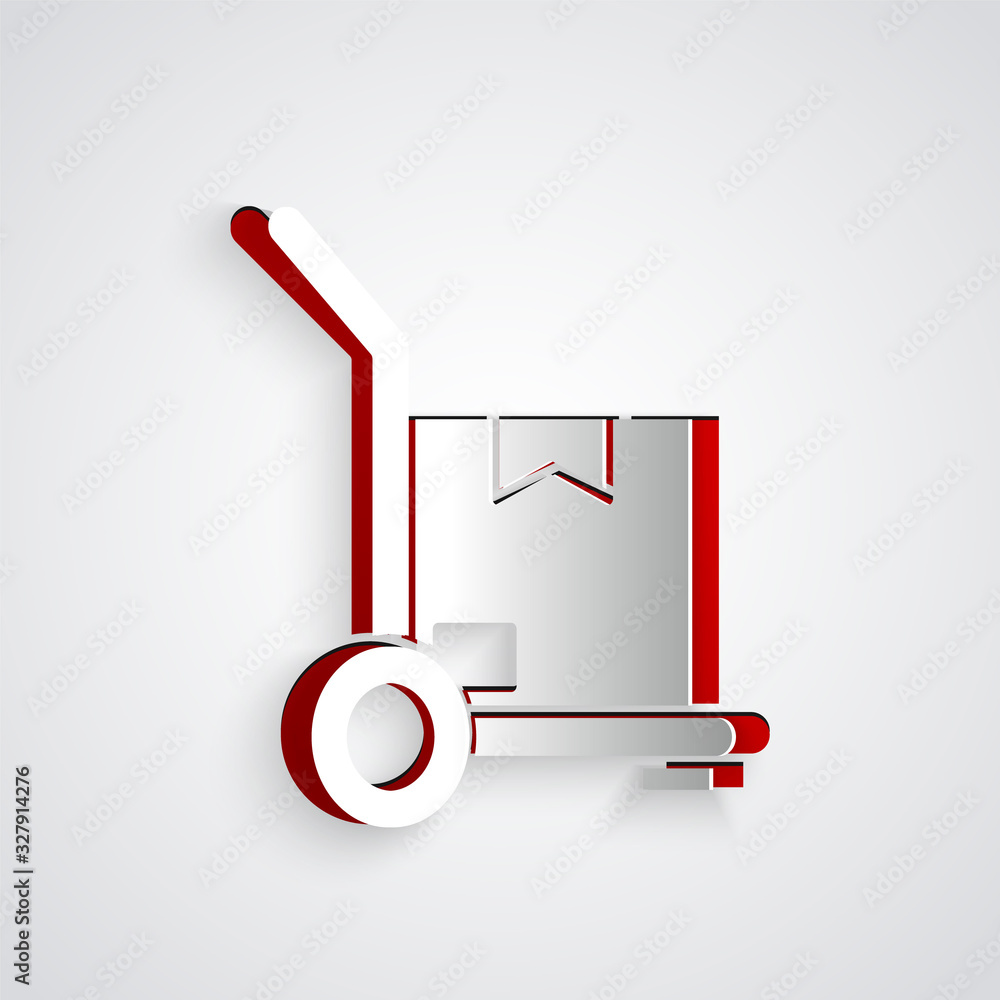 Paper cut Hand truck and boxes icon isolated on grey background. Dolly symbol. Paper art style. Vect