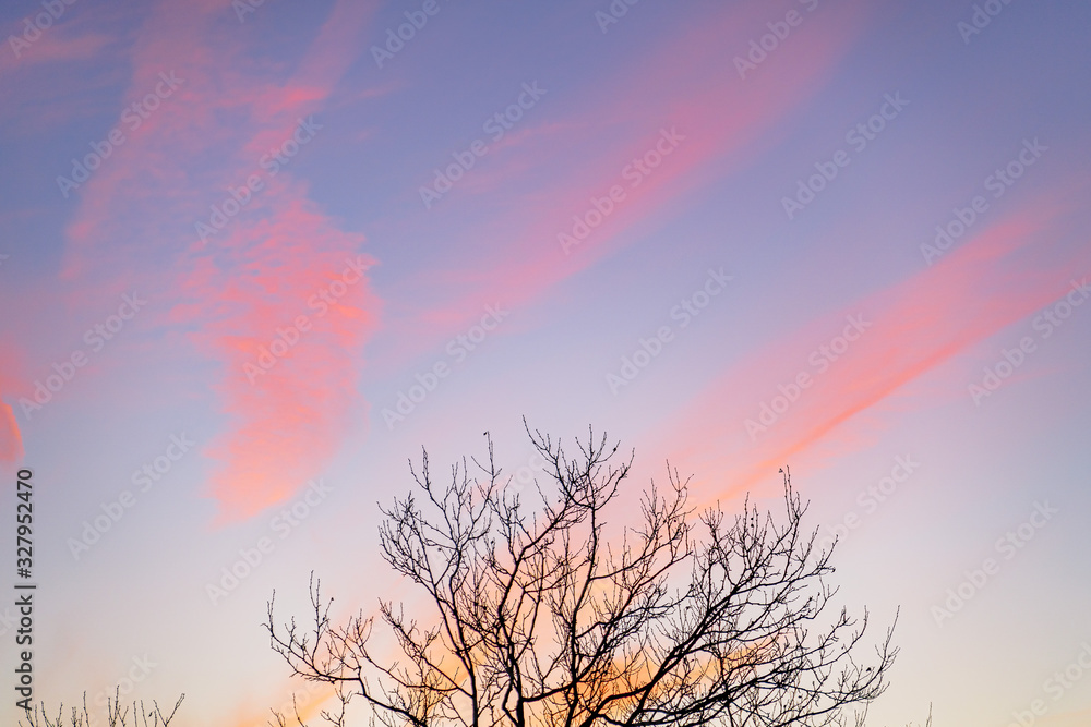 Beautiful Brooklyn winter sky with clouds at red sunset.