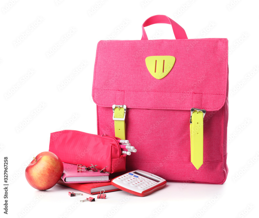 School backpack and stationery on white background