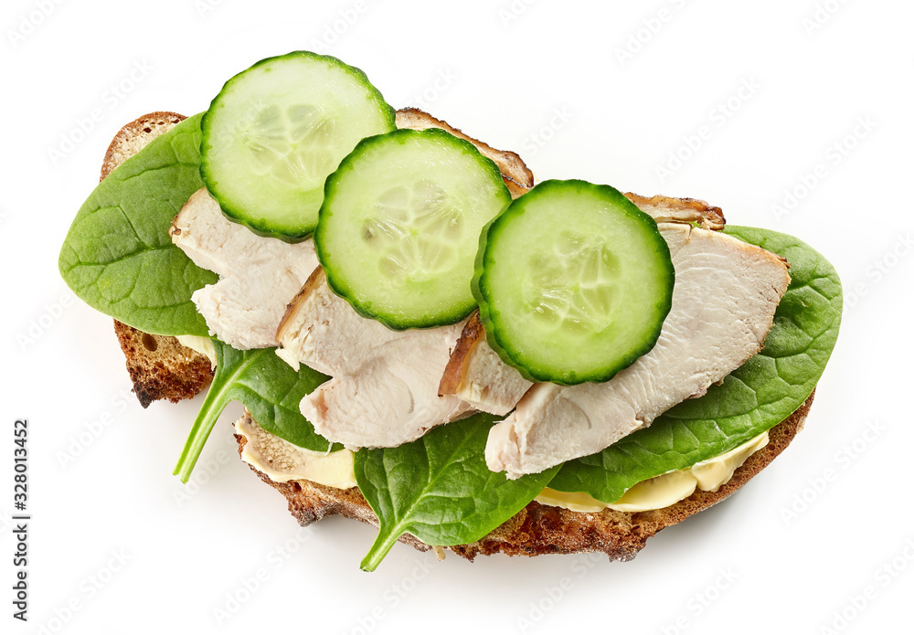 slice of bread with chicken meat and cucumbers