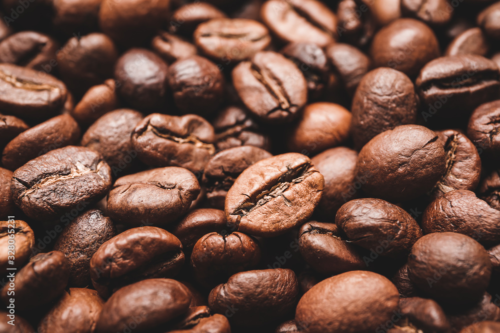 Many coffee beans as background, closeup