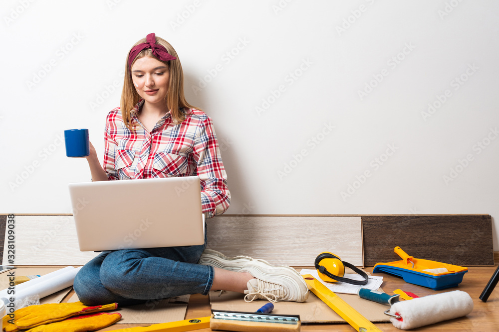 Beautiful girl using laptop computer at home