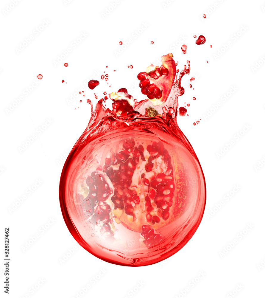 Chopped pomegranate are sinking in splashes of juice, isolated on white background