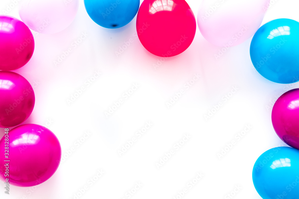 Colorful balloons frame on white background top-down frame copy space