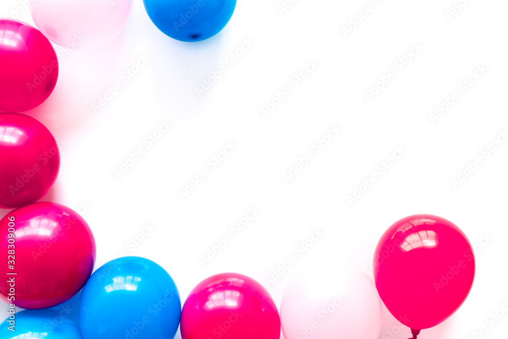 Colorful balloons frame on white background top-down frame copy space