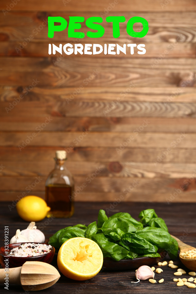 Ingredients for pesto sauce on wooden background