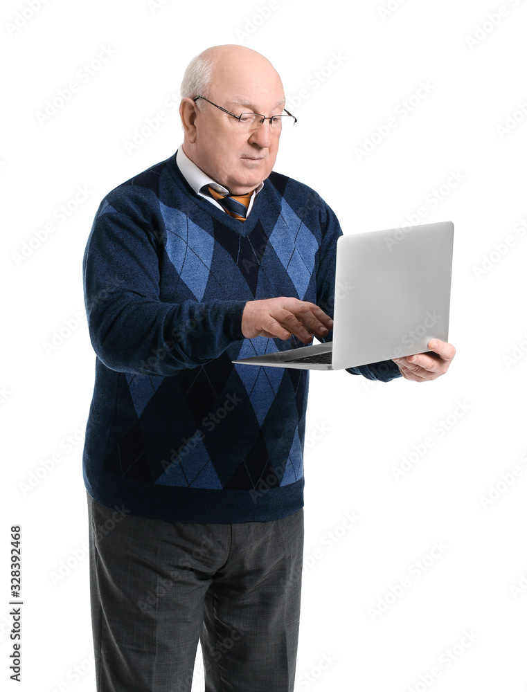 Portrait of elderly man with laptop on white background